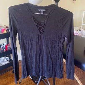 Black long sleeve criss cross chest decal